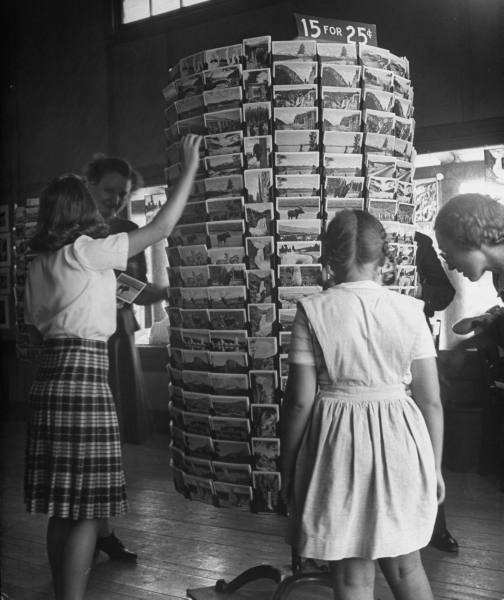 Tourists buying postcards at Yellowstone National Park, 1946. Photo - Alfred Eisenstaedt